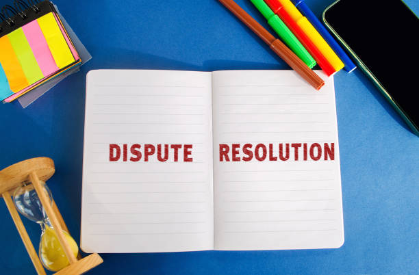 istock Notebook with inscription Dispute Resolution. Law and justice concept. Litigation, arbitration, mediation. ADR. Search for compromises. Lawyer services 1309760128
