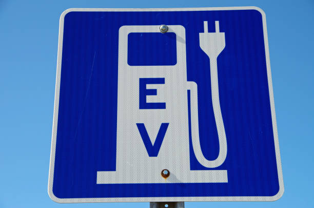 istock EV charging station sign against blue sky 1309760146
