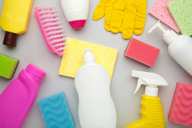 istock Set of cleaning tools on a grey background. 1309764246