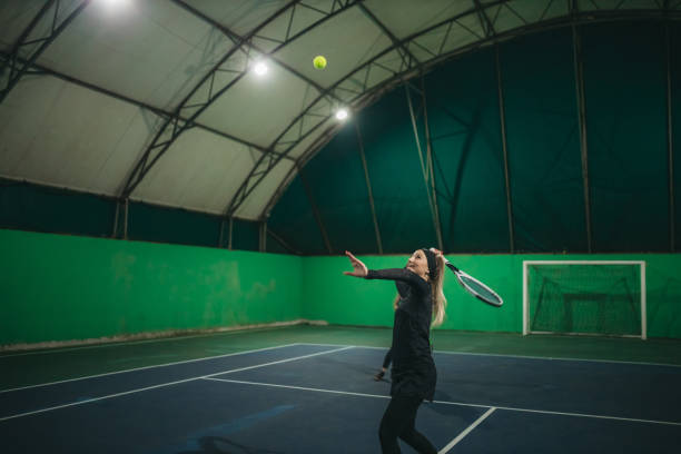 istock A young girls playing tennis 1309767050