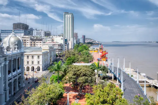 The Malecon Simon Bolivar" Avenue in Guayaquil with the Municipality building and other modern buildings; which is next to the pier and Guayas river.