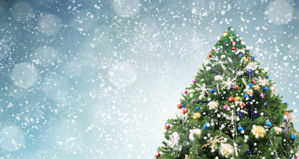 istock Decorated Christmas tree on  blurred background. Pine Cone And Snow Flakes 1309771092