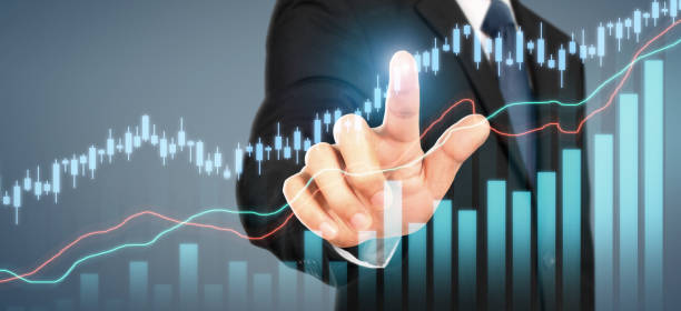 istock Businessman plan graph growth and increase of chart positive indicators 1309771359