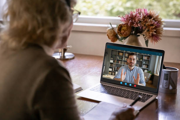 istock Older woman holding online conversation with grown up son. 1309772500