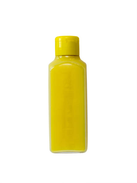 istock Yellow plastic bottle insulated on white background. 1309772705
