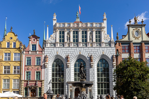 Gdansk, Poland - Sept 6, 2020: Neptune Fountain and Artus Court; at Long Market Street in Gdansk. Poland