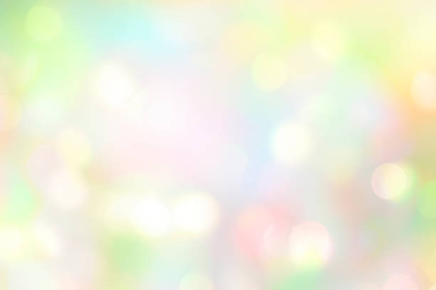 istock Soft colorful spring blurred background,glowing natural Easter holiday wallpaper.Abstract green blue yellow bokeh. 1309774105