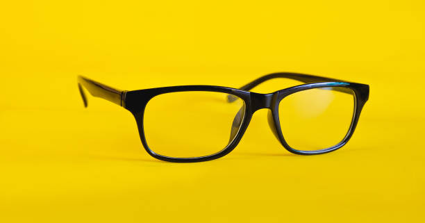 istock Modern eye glasses  with shiny black frame For reading daily life. 1309777811