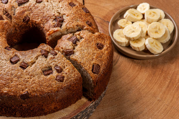 istock Homemade rustic cake with pieces of chocolate. 1309778980