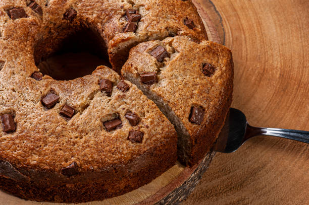 istock Homemade rustic cake with pieces of chocolate. 1309779097