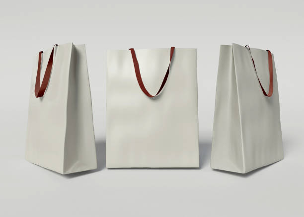 istock 3D Illustration. Three white shopping bags. 1309783389