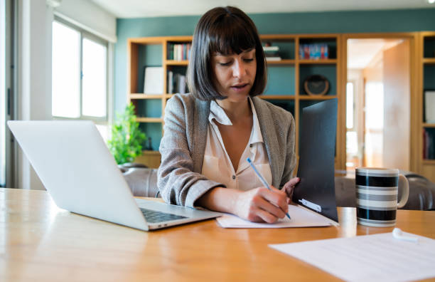 istock Business woman working from home. 1309783477