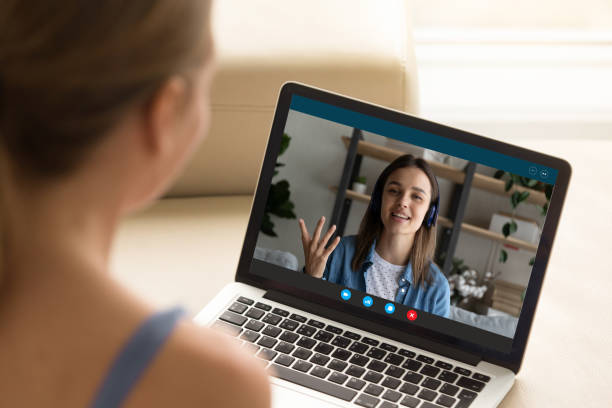 istock Young woman enjoying web cam video call conversation with friend. 1309784468