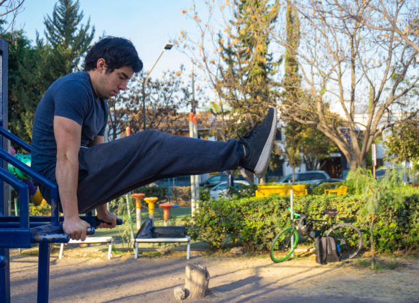istock young man exercising in park 1309785296