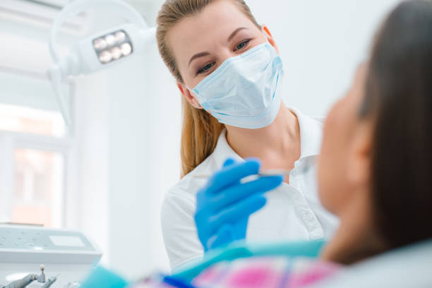 istock Professional dental care in modern friendly clinic 1309785350