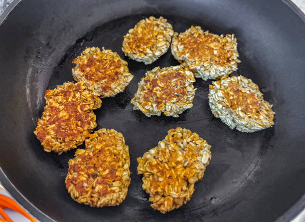 Vegan healthy oat biscuits being the pan.