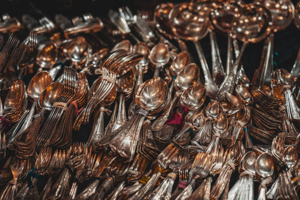 istock Vintage tablespoons and teaspoons of gold silverware 1309789734