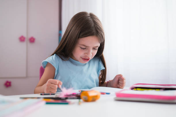 istock Girl depressed about homework 1309789823