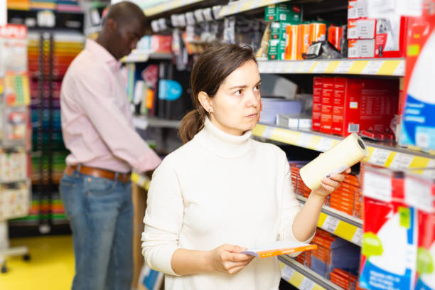 istock Ordinary woman holding office supplies 1309791188
