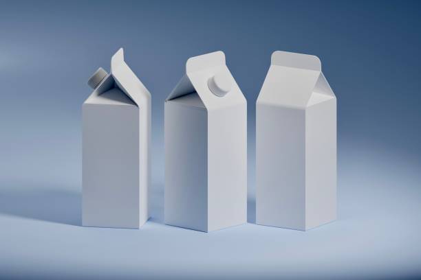 istock Milk or juice boxes with lid. Retail package mockup. 3d render illustration isolated on blue background 1309795687
