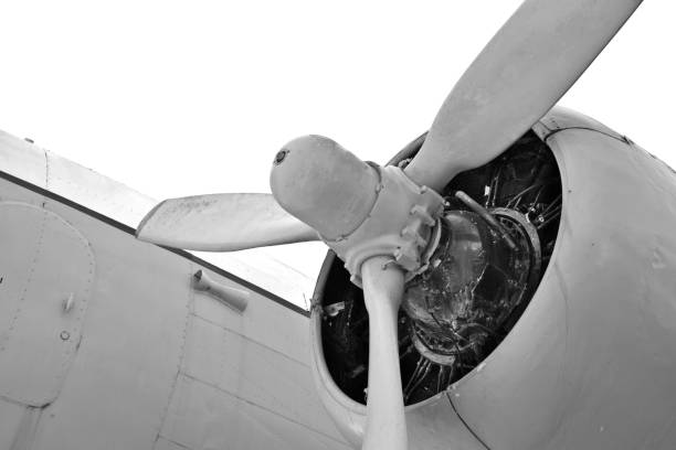 istock a black and white propeller aircraft front view and its engine 1309800831