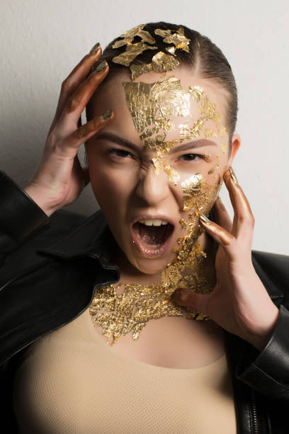 istock Expressive brunette model with fantasy makeup 1309801686