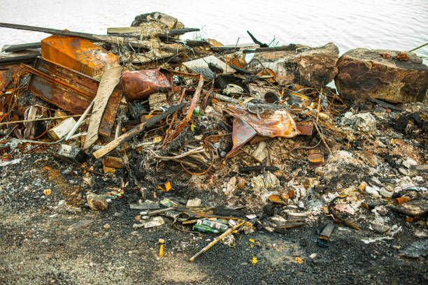 istock Burnt and rusty metal scrap in a pile.. 1309802755