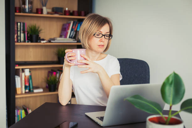 istock Woman working from home on a laptop 1309803931
