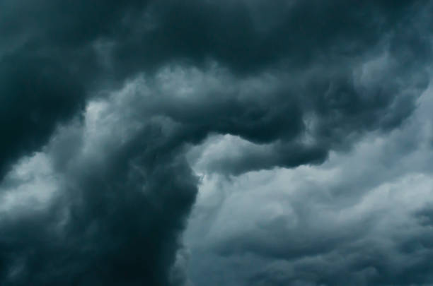 istock Dark Clouds closeup on the Sky Background. rain cloud, storm cloud before a thunder storm 1309805469