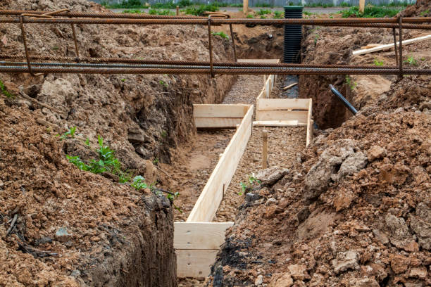 istock trench with rubble and formwork, which is prepared for pouring t 1309805611