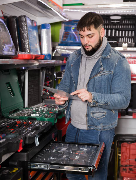 istock Attentive male is choosing ratchet in store 1309806842