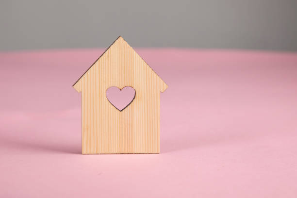 istock house model with window heart 1309807898