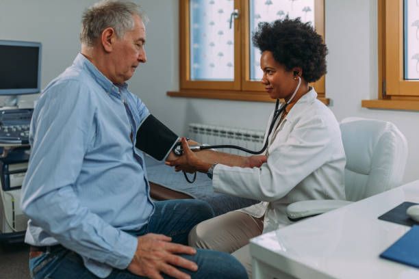 istock Patient getting measured blood pressure on doctor's appointment 1309809057