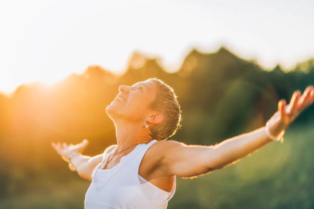 istock Embracing the positive energy with open arms 1309812611
