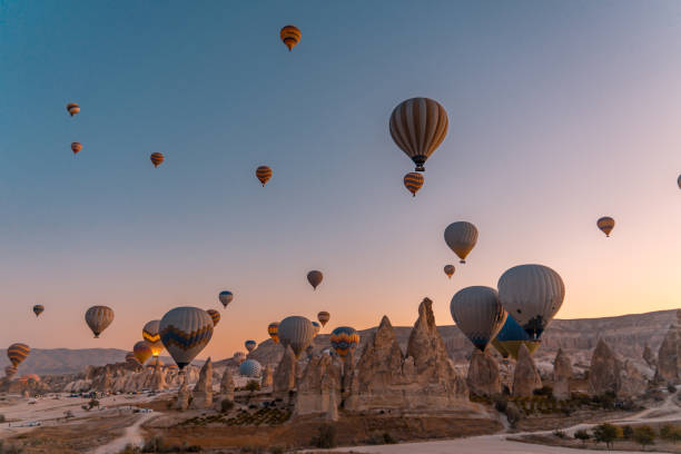 istock hot air balloon at sunset 1309813087