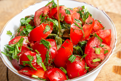 Tomato Salad. Bright advertising vegetable background.