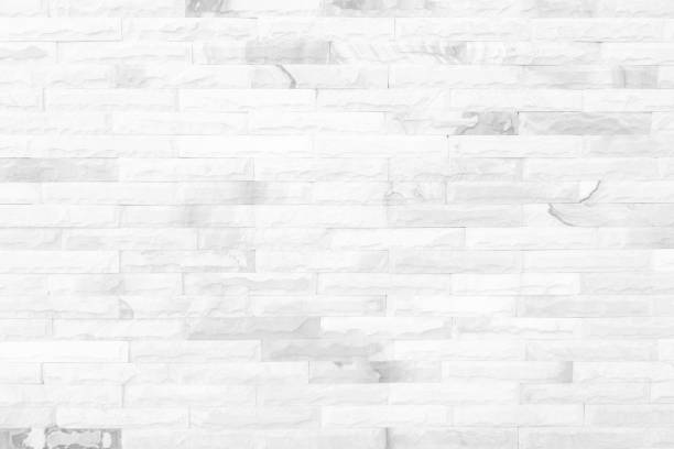 istock White grunge brick wall texture background for stone tile block painted in grey light color wallpaper modern interior and exterior and room backdrop design 1309819315