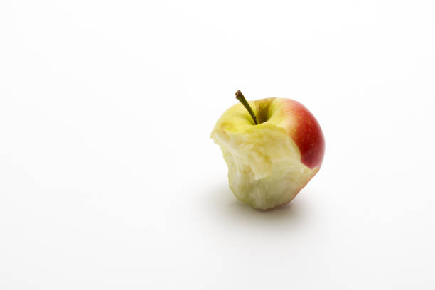 istock A ripe red apple isolated on a white background. Red bitten apple on white background. Apple Clipping Path. 1309819339