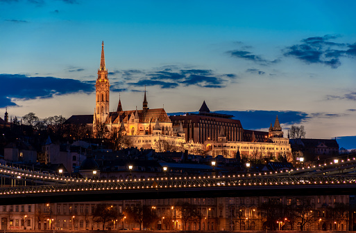 Budapest, Fisherman's Bastion against the background of evening twilight, city lights at night.  Urban landscape