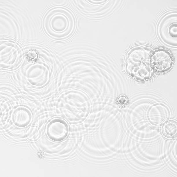 istock Water background. White water texture, blue mint water surface with rings and ripple. Spa concept background. Flat lay, top view, copy space, square composition with copy-space 1309820982