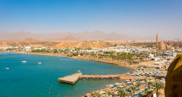 beautiful panoramic view of Sharm el-Maya bay, Hadaba in Sharm el-Sheikh, Egypt, South Sinai, with clear blue sea, mysterious mountains and an incredibly cozy bay stock photo
