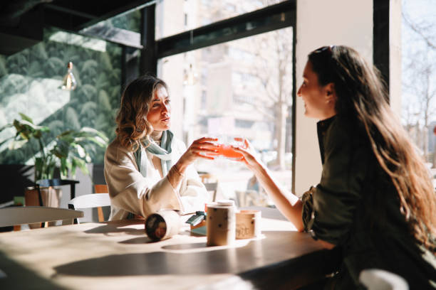 istock Female friends spending time in the cafe 1309823695