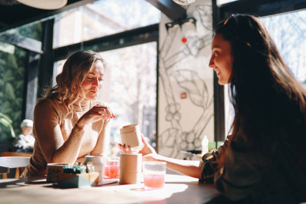 istock Female friends spending time in the cafe 1309823835