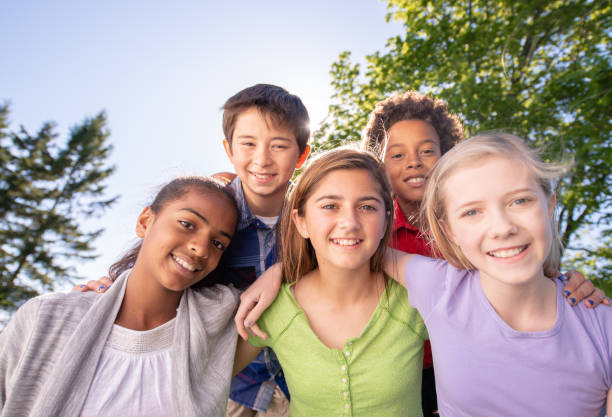 istock Ten Year Old Children Posing And Smiling For the Camera 1309836161