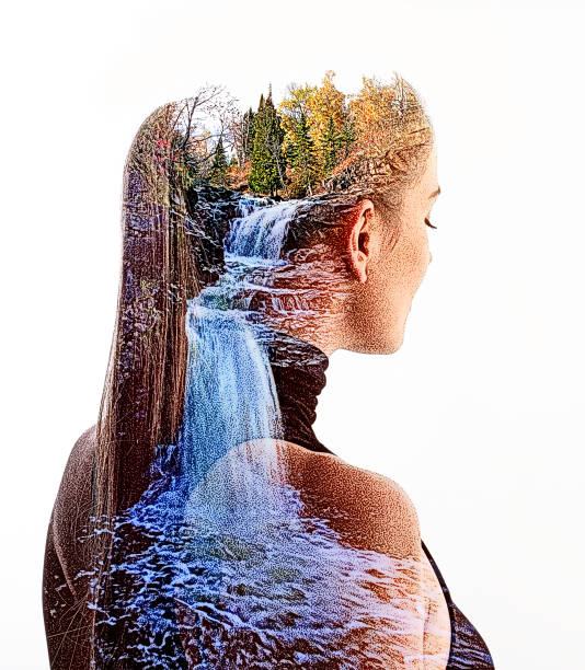 istock Multiple Exposure of young woman and waterfall 1309842232