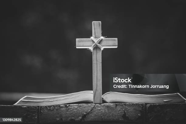 The Wooden Cross Over Opened Bible On Wooden Tableworship Religious Concept Eucharist Therapy Bless God Helping Repent Catholic Easter Lent Mind Pray Stock Photo - Download Image Now