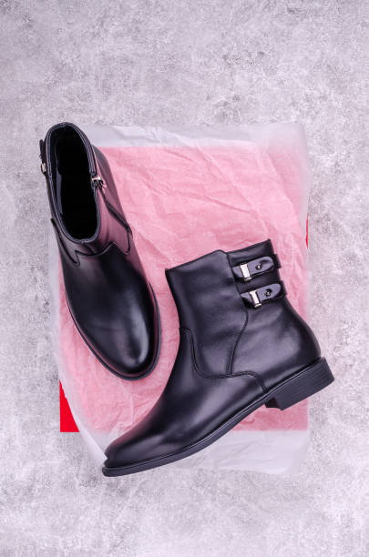 istock New black womens boots 1309850359