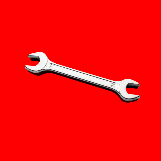 istock Wrench isolated on red background. Clipping path 1309851416