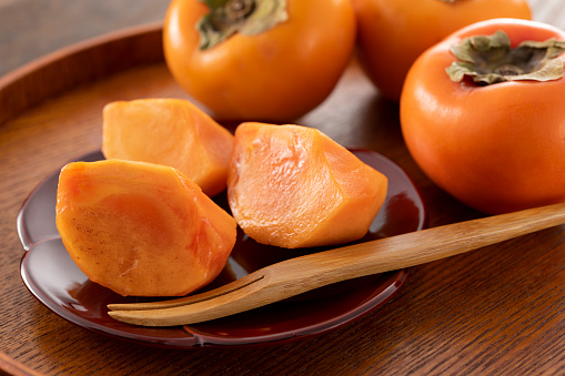 Persimmon orange color is scenery of autumn in Turkey.\nFresh kaki Ready to Eat.