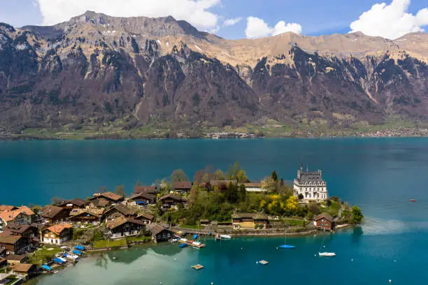 Aerial view of the famous Iseltwald village on the shores of lake Brienz near Interlaken in Canton Bern, Siwtzerland